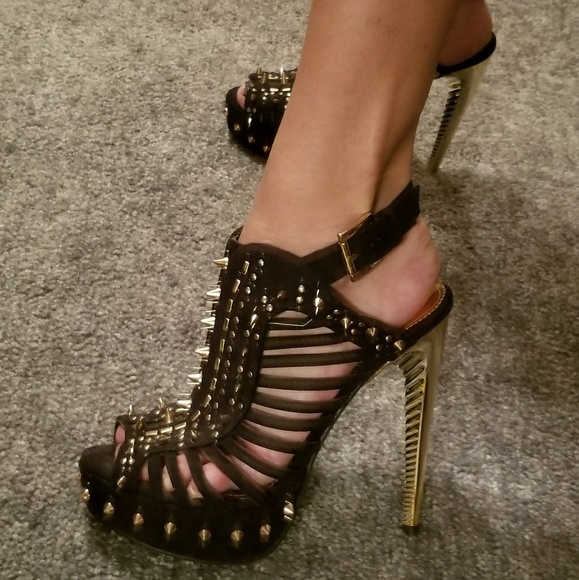 black heels with gold spikes